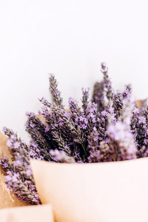 Bouquet of fresh lavender on a gray concrete background. Blooming background. Card for congratulations. Front viewの写真素材