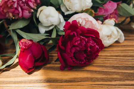 Flower arrangement of pink and white peonies. Close up natural background