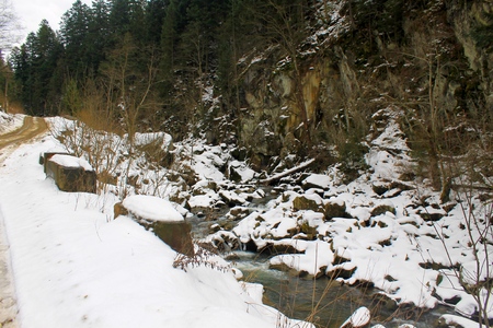 Winter river in Carpathian mountainsの写真素材