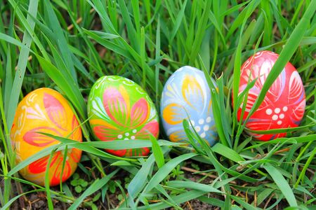 Easter eggs in the spring meadowの写真素材