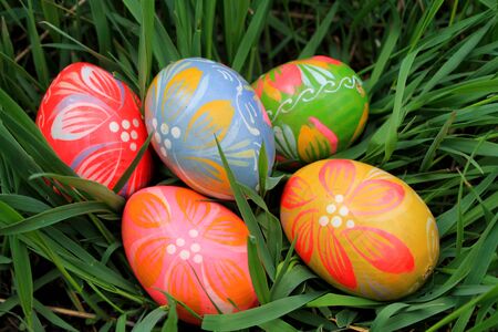 Easter eggs in the spring meadowの写真素材