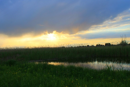 Beautiful sunset over calm lakeの写真素材