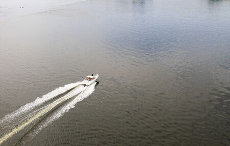 Aerial view of motorboat on the river Dnieperの写真素材
