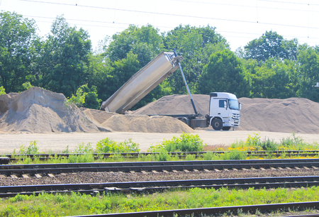 Tipper truck unload gravelの写真素材