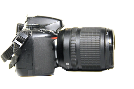 Black digital camera isolated on white background