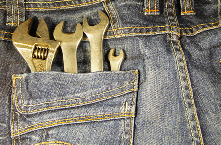 Wrench tools in the blue pocket jeansの写真素材