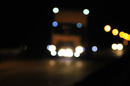 Bokeh blurred car lights at the nightの写真素材
