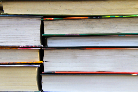 Many new books on a shelf. Books backgroundの写真素材