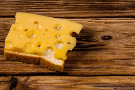 Cheese sandwich on wooden tableの写真素材