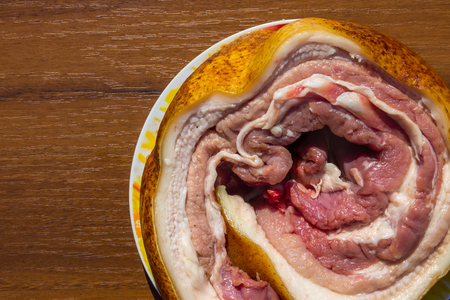 Fresh raw pork belly on wooden table. Top viewの写真素材