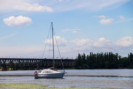 White sailing yacht on the river Dnieperの写真素材