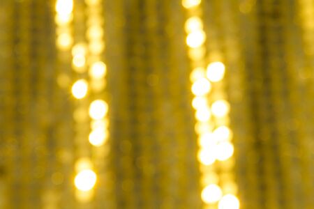 Golden holiday festive bokeh backgroundの写真素材