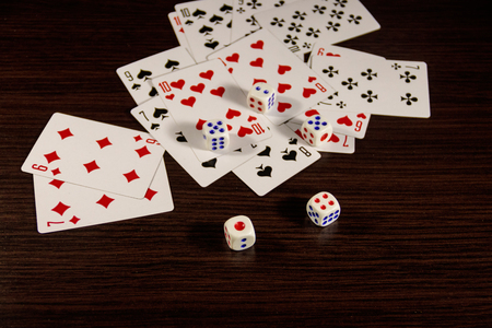 Playing cards and dice on a table. Game conceptの写真素材