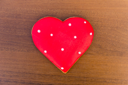 Heart shaped cookies for valentine day on wooden table. Top viewの写真素材