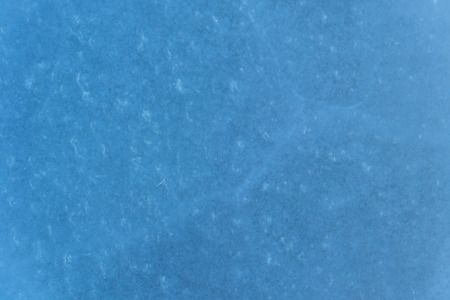 Texture of the ice surface. Winter background