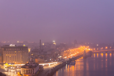 Kiev, Ukraine - November 25, 2017: View of the Dnieper River, River station and the historic district of Podil. Night Kyiv cityのeditorial素材