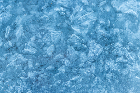 Texture of the ice surface. Winter background