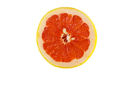 Slice of ripe grapefruit isolated on white backgroundの写真素材