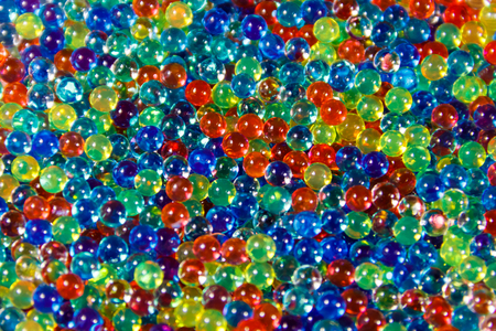 Background of multicolored hydrogel ballsの写真素材