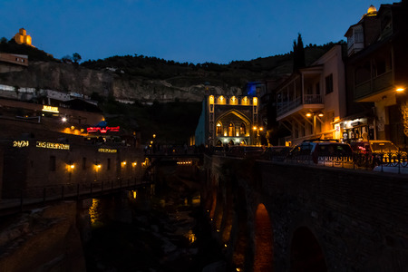 Night view of ancient district Abanotubani, known for its sulfur baths in Tbilisi, Georgiaのeditorial素材
