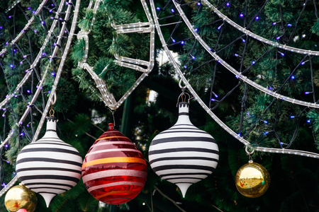 Beautiful Christmas decorations hanging on Christmas treeの写真素材