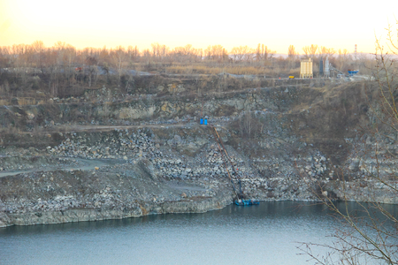 Lake in the stone quarry on autumnの写真素材