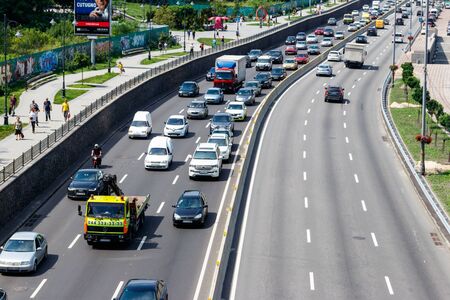 Kiev, Ukraine - July 28, 2018: Traffic cars on the multi lane highway during rush hourのeditorial素材