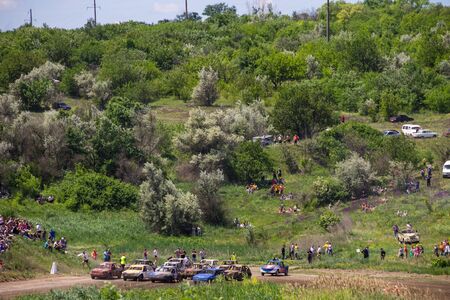 Alexandria, Ukraine - June 10, 2017: Old damaged cars stock race. Racing in the open air with dust....