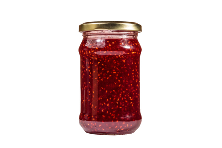 Raspberry jam in glass jar isolated on white background