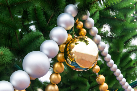 Beautiful Christmas decorations hanging on Christmas treeの写真素材