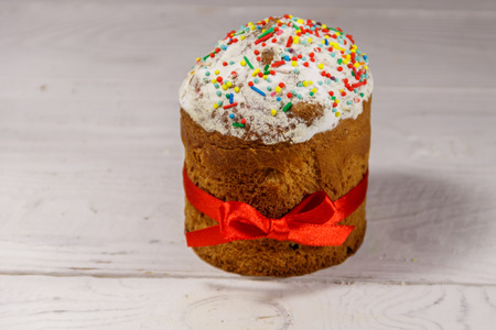 Easter cake on white wooden table