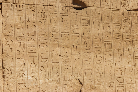 Ancient egyptian hieroglyphs on the wall in Karnak Temple Complex in Luxor, Egypt