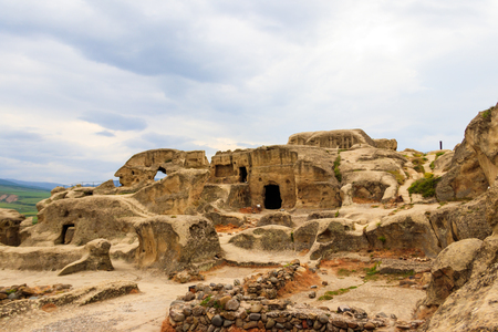 Old cave city Uplistsikhe in Caucasus mountains, Georgiaの写真素材