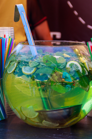 Large glass bowl with mojito cocktailの写真素材