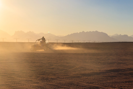 Safari trip through egyptian desert driving buggy cars