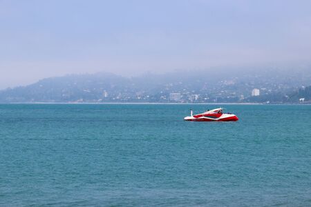 Batumi, Georgia - May 3, 2018: Motorboat sailing on Black sea. Summer leisureのeditorial素材