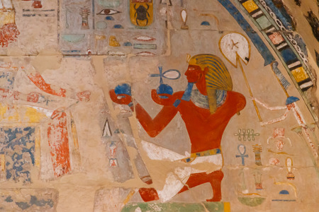 Ancient egyptian painting at the Mortuary Temple of Hatshepsut in Luxor, Egyptの写真素材