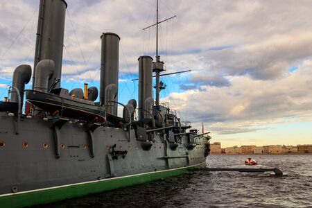 Old revolutionary Aurora cruiser,  the symbol of the October revolution, currently preserved as a museum ship on the Neva river in Saint Petersburg, Russiaの写真素材