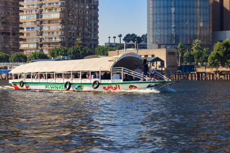 Cairo, Egypt - December 8, 2018: Pleasure boat on sailing down the Nile river in Cairo, Egyptのeditorial素材