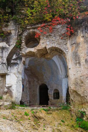 Lyadovsky rocky monastery is a male monastery located on a rocky terrace of the 90-meter high mountain over the Dniester river on its left bank, near Lyadova village in Vinnytsya region, Ukraineの写真素材
