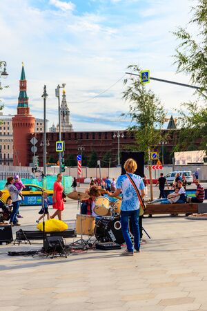 Moscow, Russia - August 15, 2019: Street musicians play guitar and drums in Zaryadye Park in Moscow, Russiaのeditorial素材