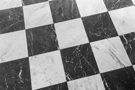 Black and white checkered marble floor. Marble texture for backgroundの写真素材