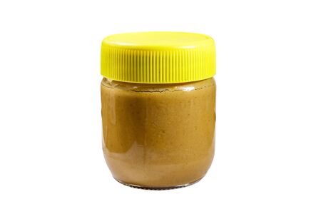Jar of peanut butter isolated on white backgroundの写真素材