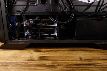 Close-up of new computer system unit with installed hard drives. Desktop PC from the inside