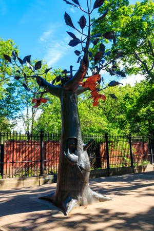 Kronstadt, Russia - June 25, 2019: Iron wish tree in Kronstadt, Russia. Cast-iron sculpture in a shape of a tree with large ears and a smileのeditorial素材