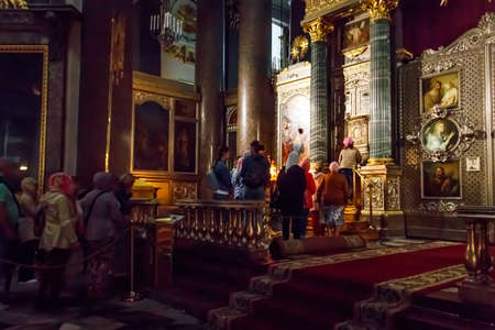St. Petersburg, Russia - June 27, 2019: Orthodox worshippers wait in line to worship the icon of Our Lady of Kazan in Kazan cathedral in Saint Petersburg, Russiaのeditorial素材