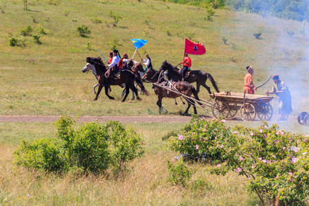 Dnepropetrovsk region, Ukraine - June 2, 2018: Ethno-rock festival Kozak Fest. Reenactment of Battle of Zhovti Vody between cossacks in alliance with Crimean tatars and Polish forcesのeditorial素材