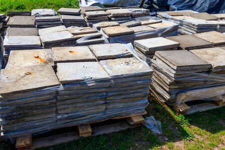 Stacks of paving slabs at construction site