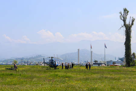 Batumi, Adjara,Georgia - May 3, 2018: Blue helicopter on a lawn in Batumi, Georgiaのeditorial素材