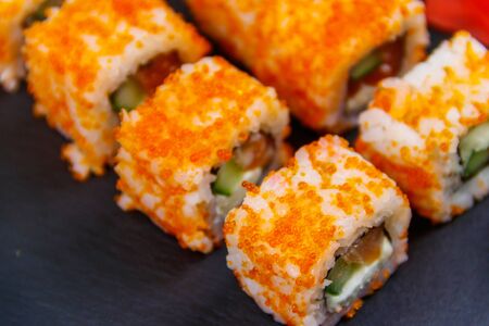 Sushi rolls Philadelphia on a black slateの写真素材